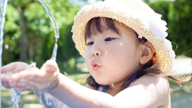 Girl drinks water by Kai Keisuke via Shutterstock