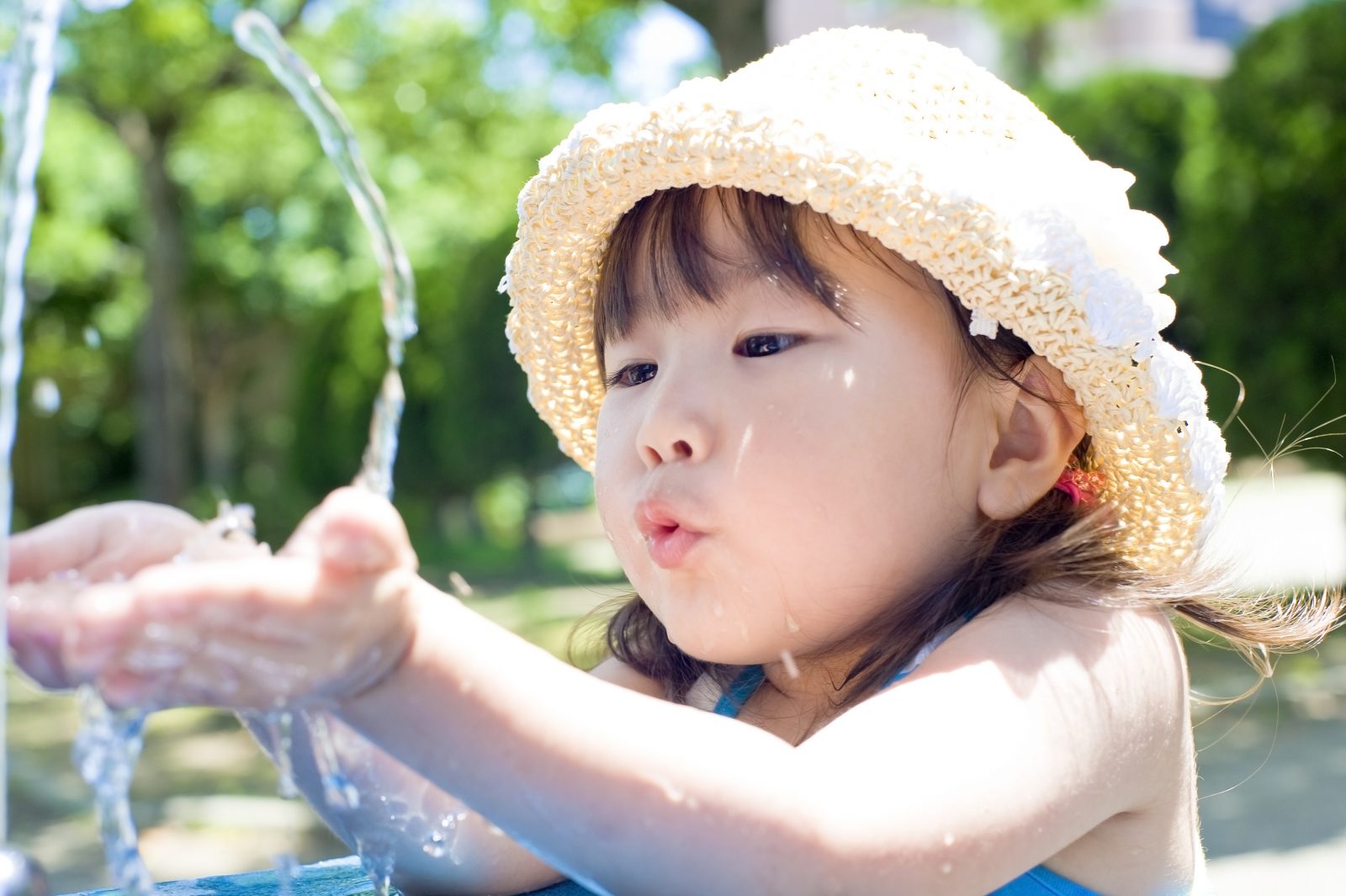 Girl drinks water by Kai Keisuke via Shutterstock
