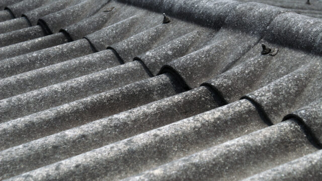 A close up of a roof made with asbestos material.