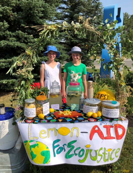 Two sisters host a lemonade stand for Ecojustice.