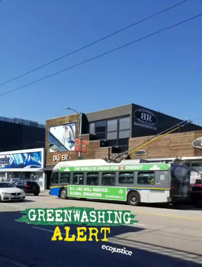 A bus with an ad declaring 'B.C. LNG will reduce global emissions'